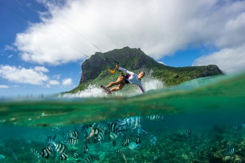 Beautiful,Girl,With,Black,Hair,Kiting,In,The,Clear,Waters